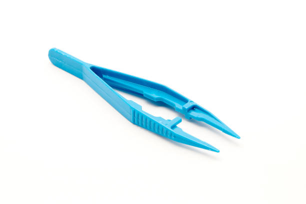 istock Close up of Plastic Blue Tweezers 981375344