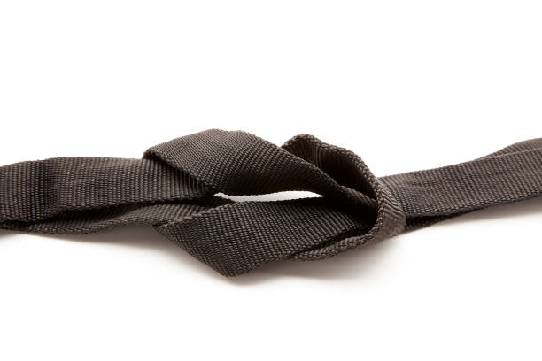 istock Two Black Ropes Tied in a Knot 981375386