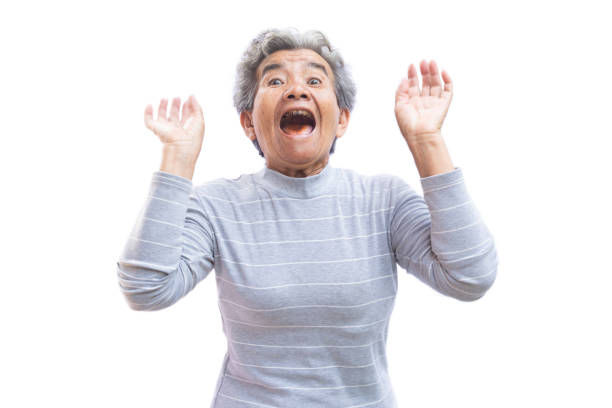 istock Happy Asian old woman joyful on white background 981383802
