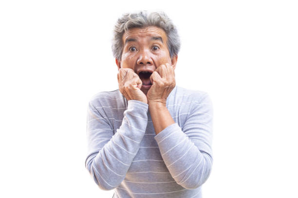 istock Happy Asian old woman joyful on white background 981384408