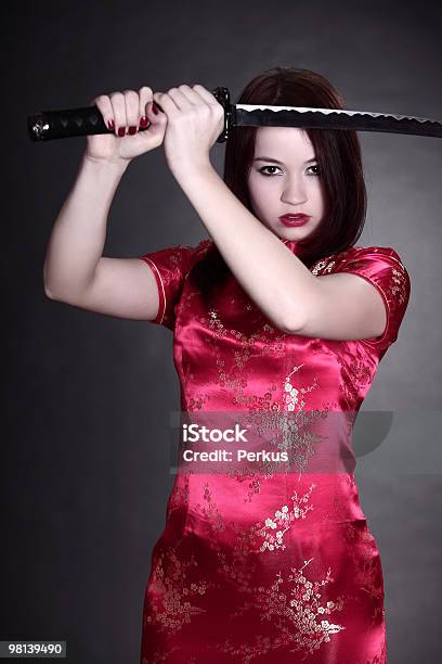 Woman In Chinese Dress Stock Photo - Download Image Now - Chinese Culture, Sword, Women