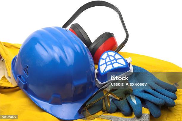 Blue Red And Yellow Safety Equipment And Uniform Stock Photo - Download Image Now - Clothing, Color Image, Ear Muff