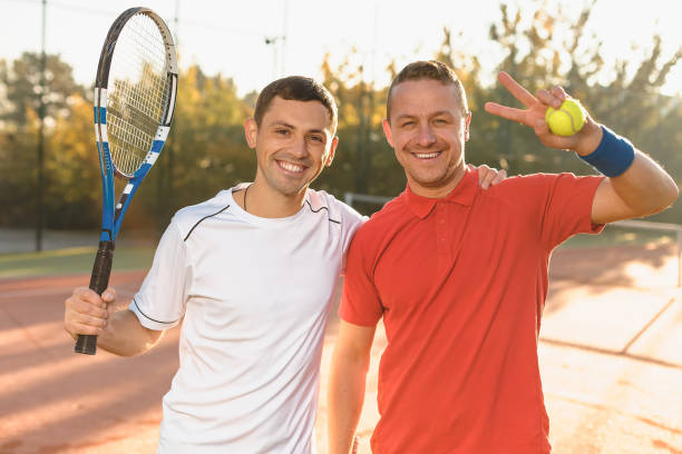 istock Men showing victory sign 981398780