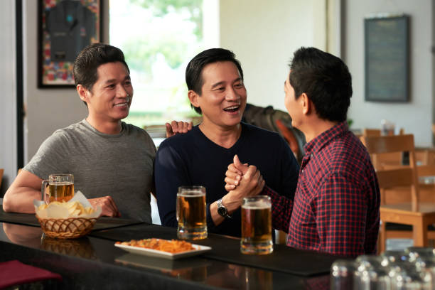 Mature friends in bar