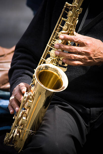 istock Musician Plays Saxophone Shiny Gold 98141430