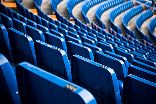 vazio de azul suporte em um estádio - bleachers olympic stadium architecture blue imagens e fotografias de stock