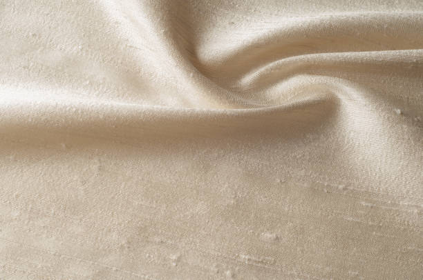 istock Texture background pattern. Linen fabric Light beige. Light brown linen cloth texture for the background. 981418836