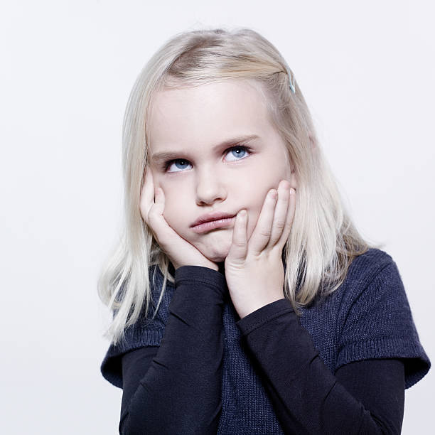 istock cute little girl sullen sulk bore 98142426