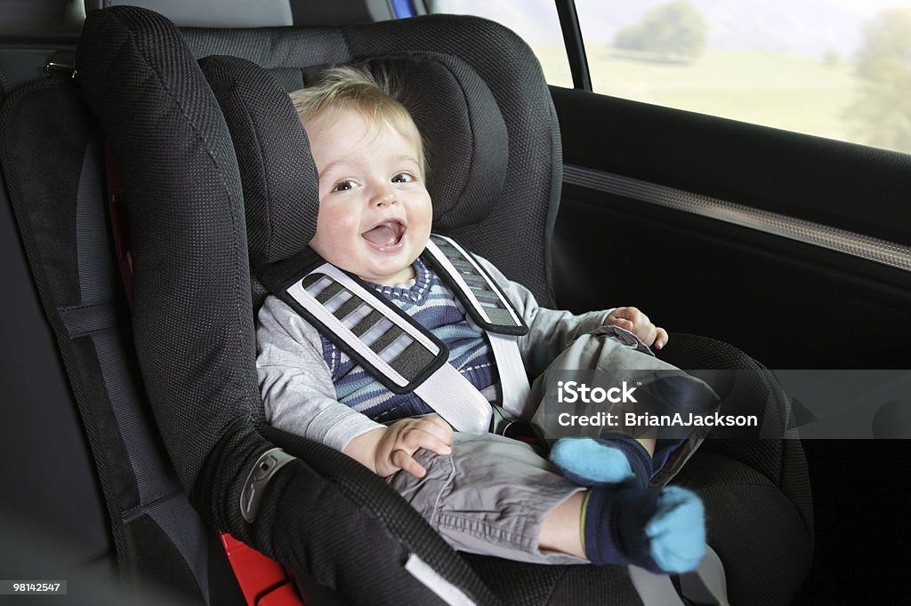 Baby Junge in seinem Kind Sicherheit Kindersitz - Lizenzfrei Kindersitz Stock-Foto