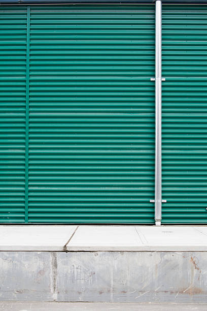 istock Industrial warehouse corrugated metal wall backgrounds, textures and patterns 98142913