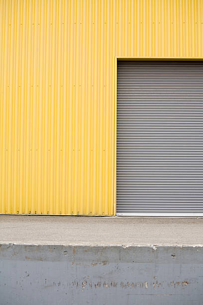 istock Industrial warehouse corrugated metal wall backgrounds, textures and patterns 98142920