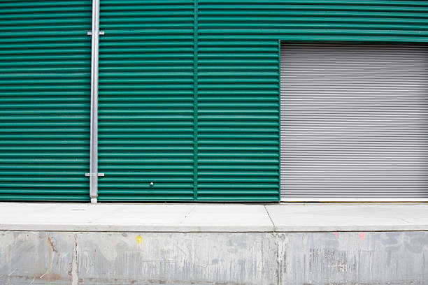 istock Industrial warehouse corrugated metal wall backgrounds, textures and patterns 98142924