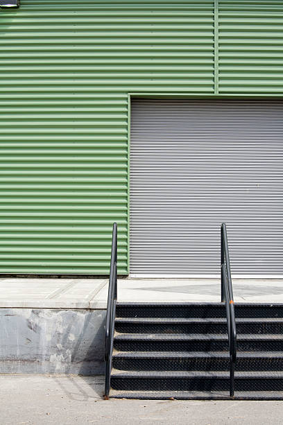istock Industrial warehouse corrugated metal wall backgrounds, textures and patterns 98142958