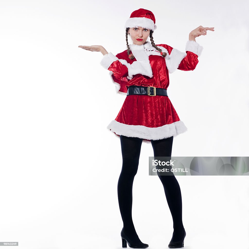 woman dressed as santa claus pouting  20-24 Years Stock Photo