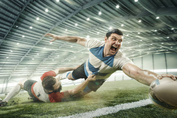 istock Two men are playing rugby and they compete with each other 981443604