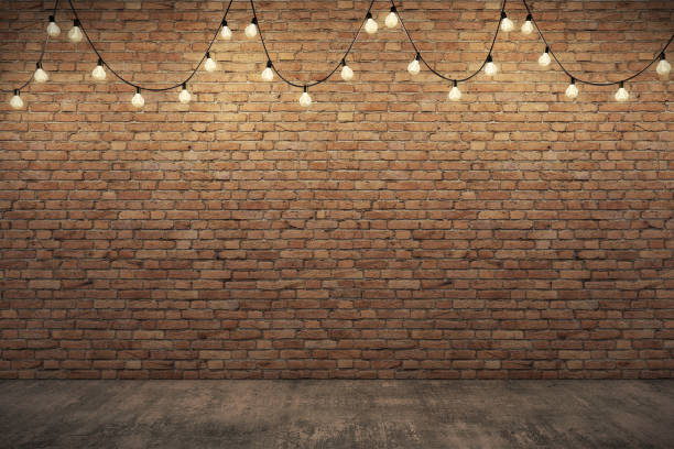 istock Orange rough brick wall & Concrete floor with lighting.3D illustration 981467640