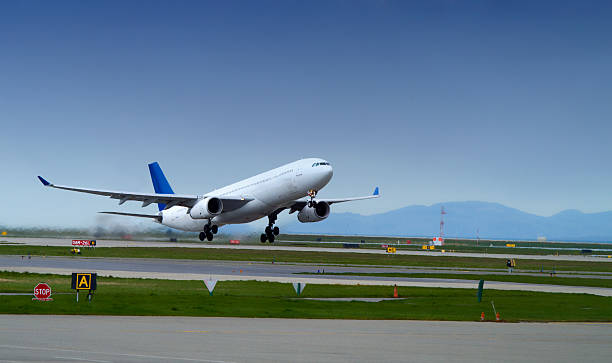 istock Large commercial airplane taking off on the runway 98147535