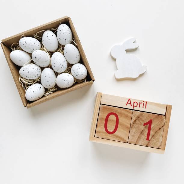 istock High Angle View Of Eggs And Calendar On White Background 981477090