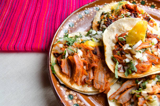 Original mexican tacos al pastorTraditional mexican food: tacos al pastor