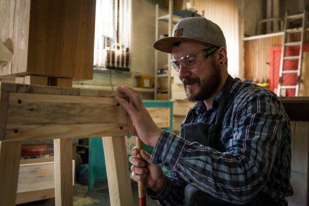 istock Close up of a carpenter work with wooden 981477774