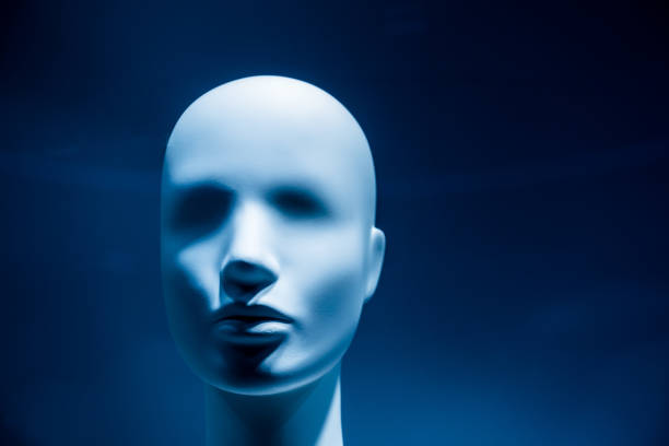 istock Close-Up Of Mannequin Against Blue Background 981482558
