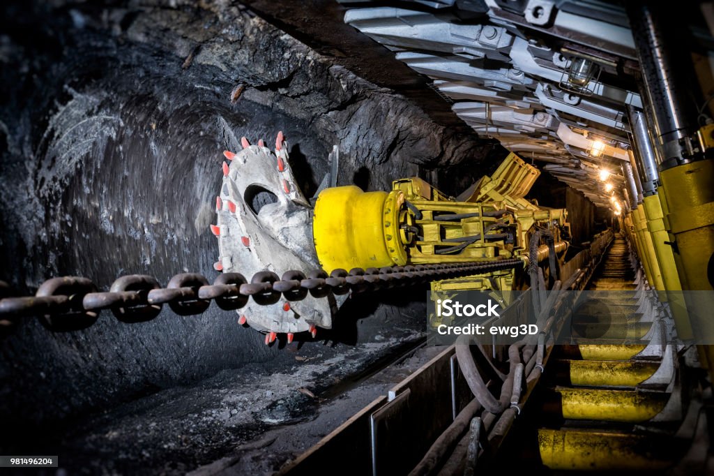 Coal mine underground corridor with support system and drilling machine Coal mine underground corridor with support system and drilling machine, Makoszowy coal mine in Zabrze, Poland Mining - Natural Resources Stock Photo