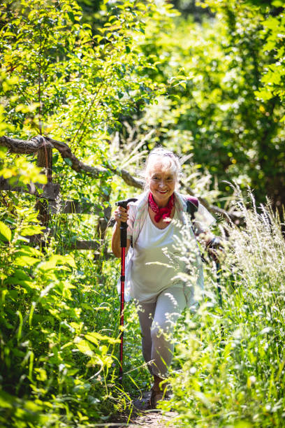 istock Elderly woman hiking 981511294