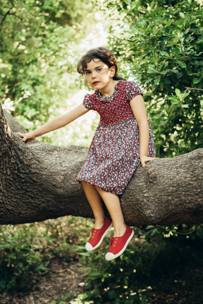 istock Girl playing outdoors 981518150
