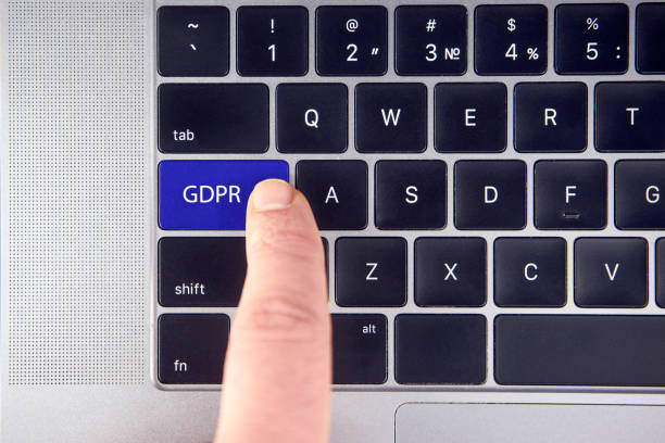 istock Hand press the button GDPR on keyboard laptop 981526772