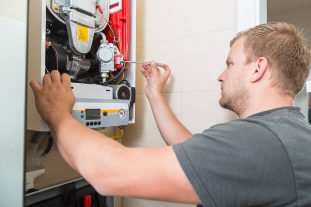 istock Technician repairing Gas Furnace 981527878