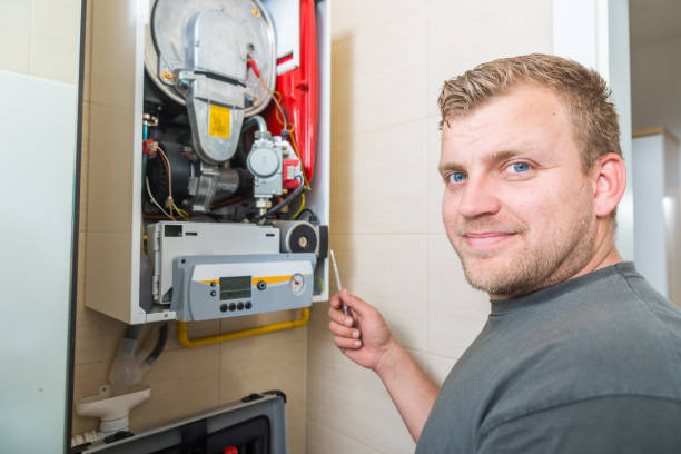 istock Technician repairing Gas Furnace 981527882