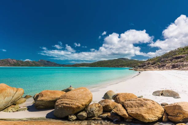 istock Rocks on amazing Whitehaven Beach with white sand in the Whitsun 981530886