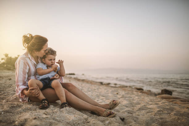 istock Mother and son at the beach 981532466