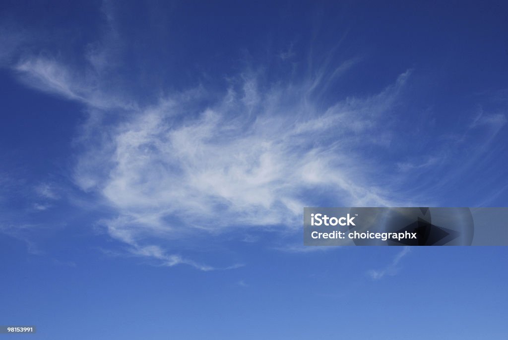 Cirrus Clouds formed like a galaxy  Blue Stock Photo