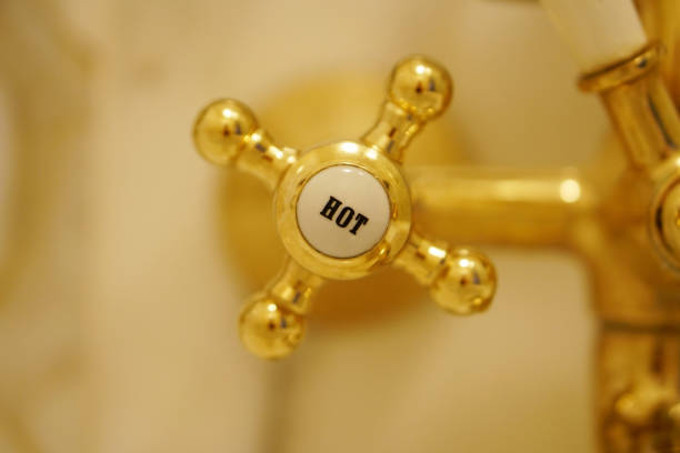 golden water tap with signature \