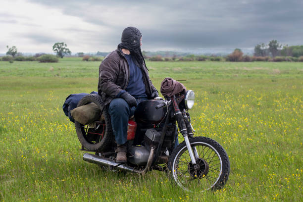 istock A post apocalyptic man on motorcycle in a meadow 981541260