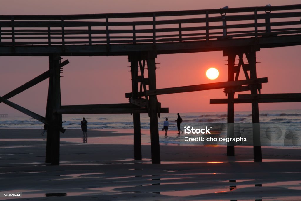 Zachód słońca w Myrtle Beach - Zbiór zdjęć royalty-free (Brzeg wody)