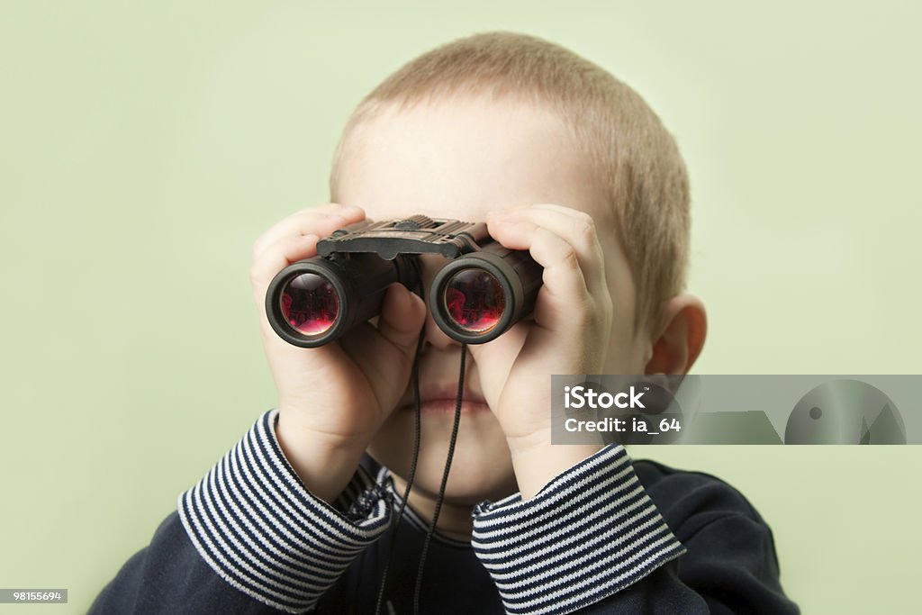 Child with binoculars  Beautiful People Stock Photo