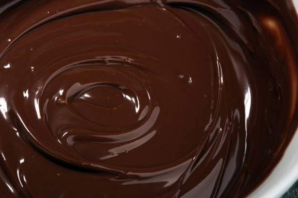 istock Melting chocolate, melted delicious chocolate for praline icing confectionery 981564766