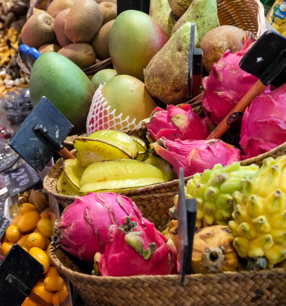 fruit & vegetables on display in a barcelona market spain - store street barcelona shopping mall imagens e fotografias de stock