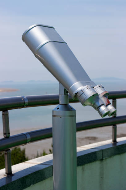 istock Telescope close-up on sky background 981587690