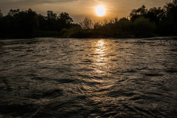 Beautiful Sunset. Valley river. Natural rural landscape view