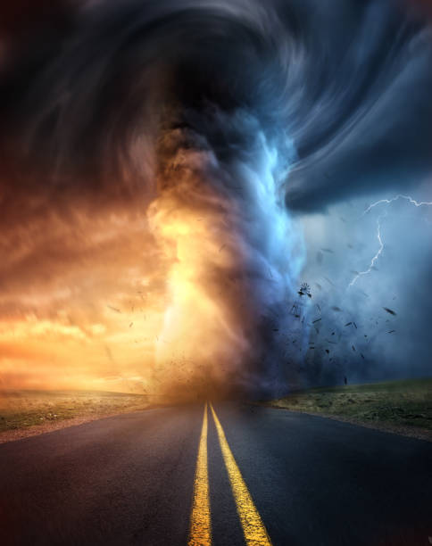 A Powerful Tornado At Sunset A powerful supercell storm at sunset producing a huge and destructive tornado touching down on a highway road. Mixed media illustration. tornado stock pictures, royalty-free photos & images