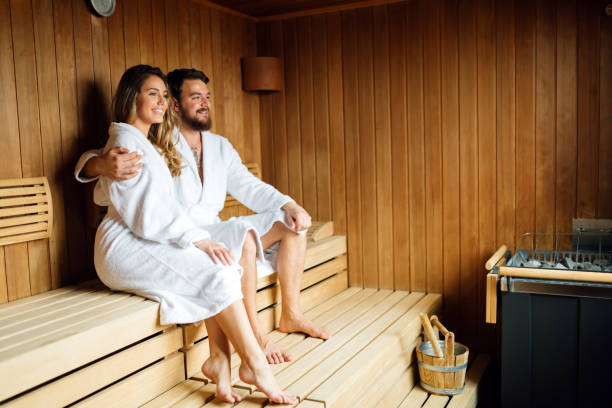 istock Beautiful couple relaxing in sauna 981626260