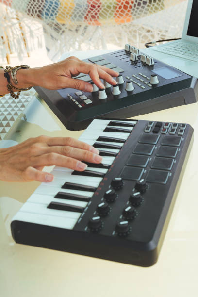 istock Hands woman DJ playing electronic music with a mixing table 981632622