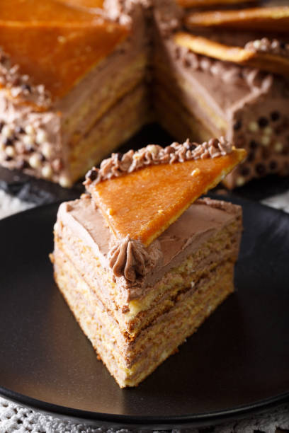 istock Slice of Hungarian Dobos cake closeup. vertical 981643652