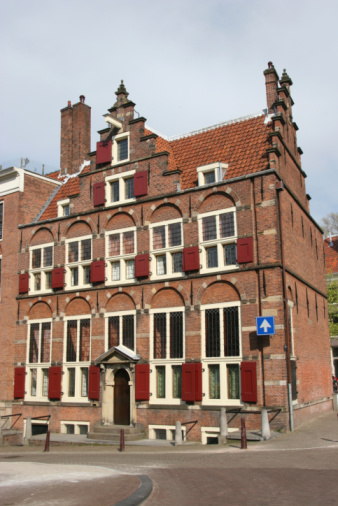 Historic canal house of the guild of the bag carriers in the old center of the Dutch city of Schiedam.