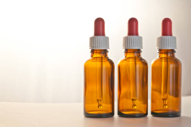 istock Brown glas bottle for medicine with dropper 981650130