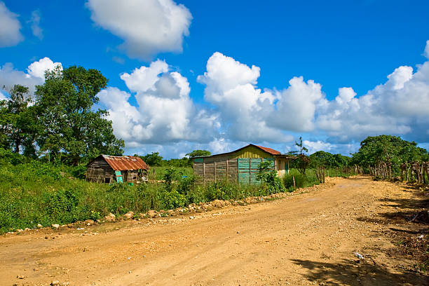 istock Road in the village under blue sky 98165219