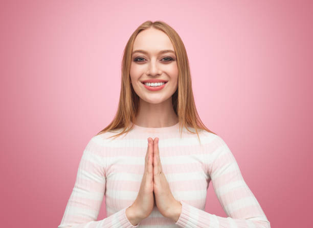 istock Woman standing in meditation position in studio 981652902